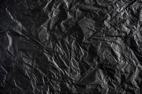 Premium Photo Black Matte Crumpled Texture Paper