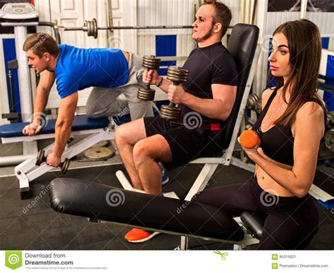 Friends In Gym Workout With Fitness Equipment Training Women Stock