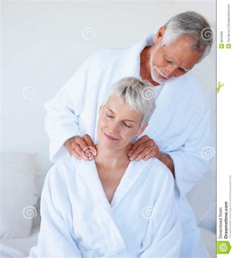 Senior Man Massaging Wife S Shoulders Stock Image Image Of Home Affectionate 8816399
