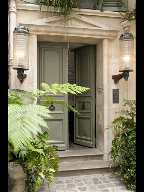 Why would a house have 2 front doors? Lovely gray- green on front door | Green front doors ...
