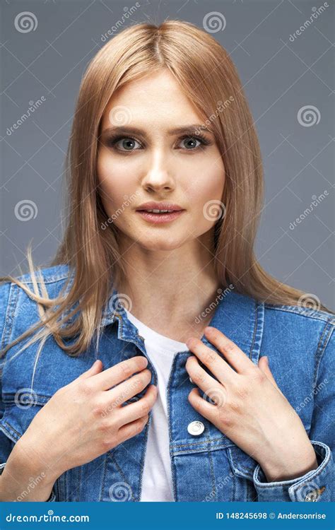 Beautiful Blonde Woman Dressed In A Denim Jacket Stock Photo Image Of European Fashion