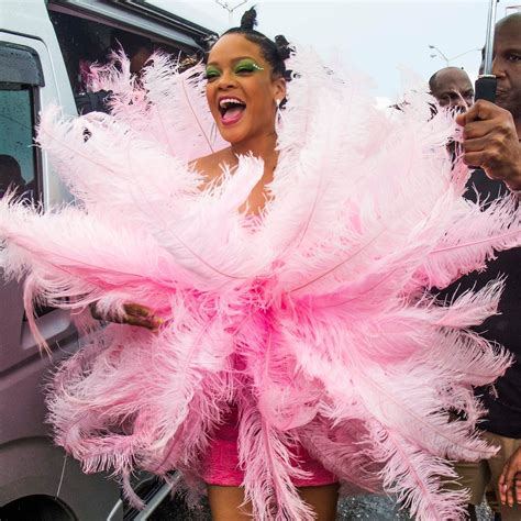 rihanna returns to barbados carnival in a full flock of feathers cr fashionbook