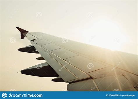 Have A Safe Trip An Airplanes Wing In Mid Flight Stock Image Image