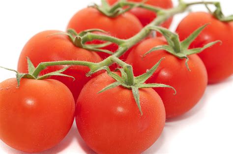 Big Red Tomatoes In A Vine On White Background 8960 Stockarch Free