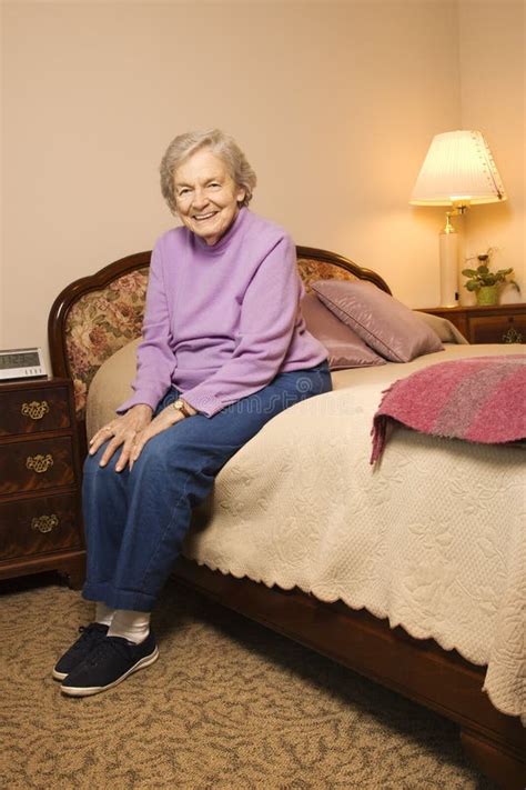 Elderly Caucasian Woman In Bedroom Stock Photo Image Of Woman