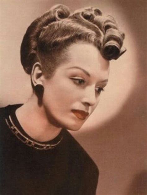 Https://tommynaija.com/hairstyle/1940 S Girls Updo Hairstyle High Bun