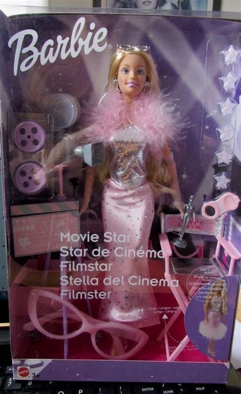 released 2003 model number 56976 barbie stars in a hit movie slide and style skirt long