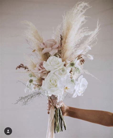 This Unique Bridal Bouquet Is Made With Pampas Grass And Huge White