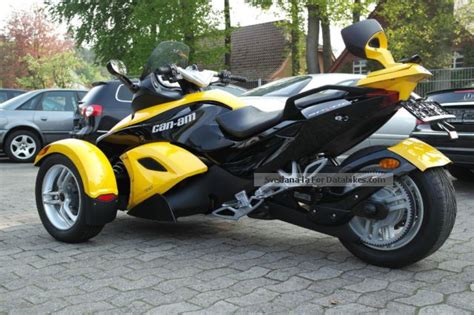 The vehicle has a single rear drive wheel and two wheels in front for steering, similar in layout to a modern snowmobile. 2009 BRP Can Am Spyder Roadster RS SE5 maintained 2.hand