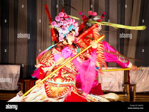 Talented And Beautiful Actress Of The Chengdu Opera Dressed In Traditional Clothing Performing