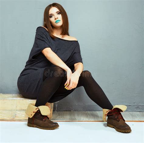 Fashion Girl Seating Posing Against Gray Stock Image Image Of