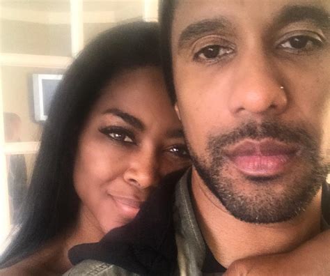 Kenya Moore Posts Photo Showing Marc Daly Being Amazed By Their Babys