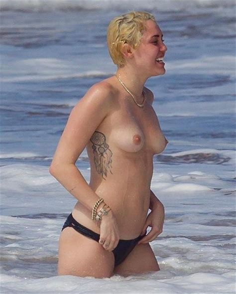 Miley Cyrus Tattoos And Topless At The Beach In Hawaii Sexy Photo Sexy Photos Erotic Photos