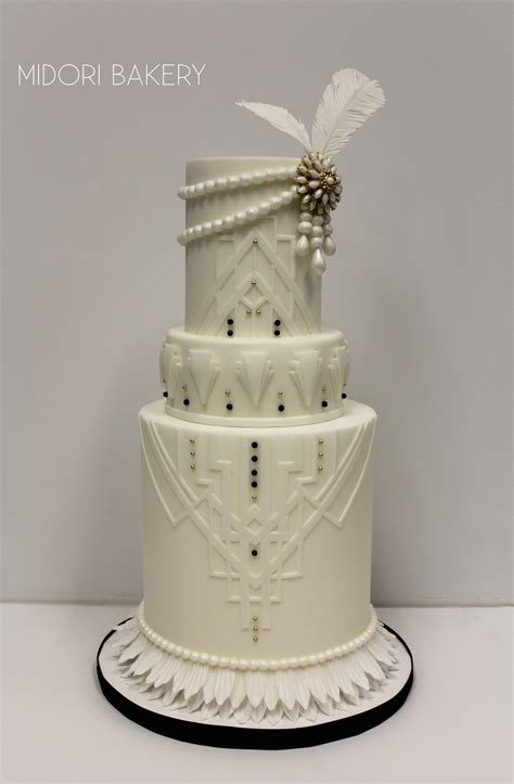 The great gatsby has inspired us to throw a roaring twenties' theme party that fitzgerald himself would be proud to attend. White Art Deco, Great Gatsby inspired wedding cake, with ...