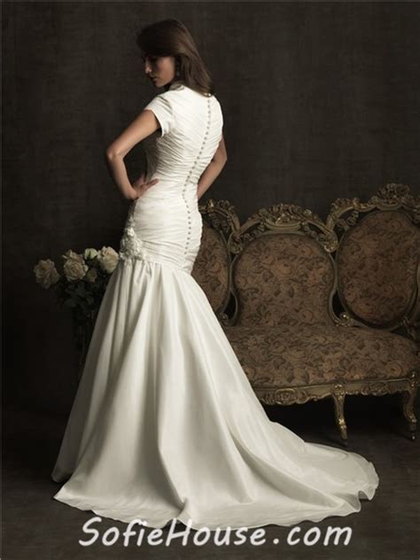 This beautiful wedding dress is made with bridal taffeta. Trumpet/ Mermaid high neck short sleeves taffeta wedding dress