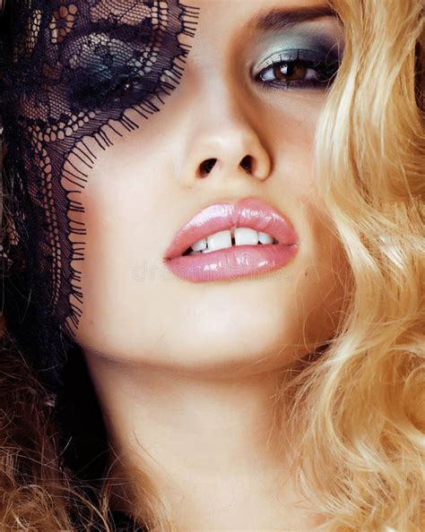 Portrait Of Beauty Blond Young Woman Through Black Lace Close Up Stock