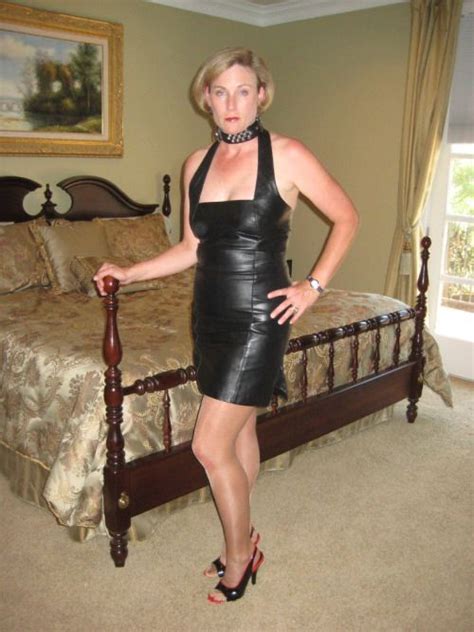 senior gynarchique old lady in satin blouse vintage skirt black leather dresses