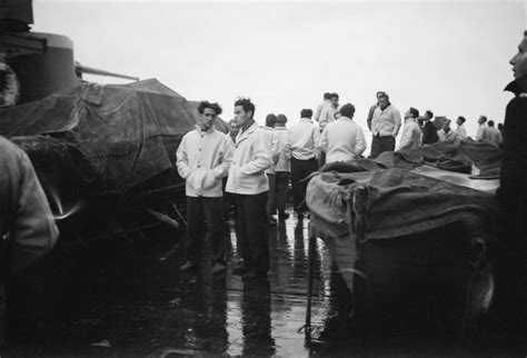 Survivors Of The Scharnhorst Under Guard On The Catapult Deck Of Hms Duke Of York At Scapa Flow