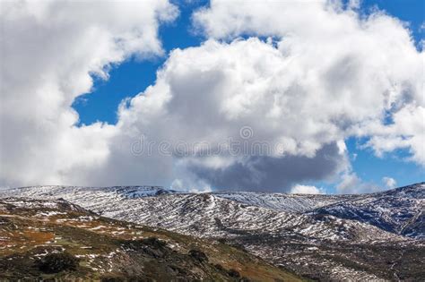 Beautiful Fluffy Clouds Over Snowy Mountains At Mount Kosciuszko