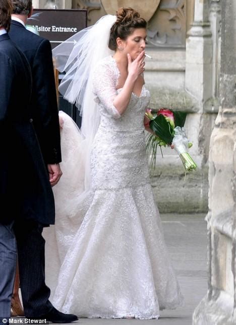 Liz Hurley Upstages The Bride Again As She Steps Out In A Canary Yellow