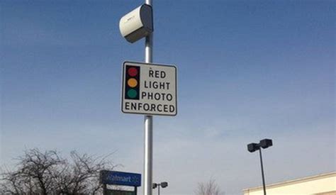 Why Should Signs Warning Of Red Light Cameras Be Posted