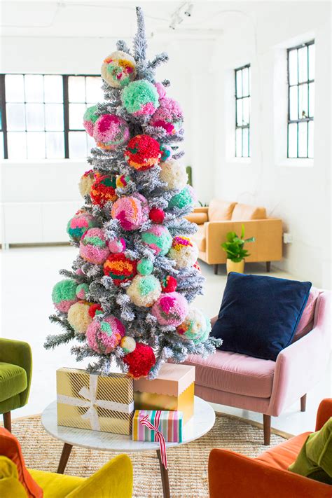 This white artificial christmas tree stands its ground with bright colours. Different Christmas Tree Decor Ideas That Will Impress You