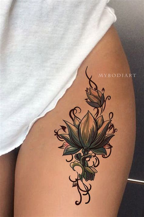 Cool black ink lily flower tattoo on right wrist. Jung Lotus Flower Temporary Tattoo in 2020 | Tattoos ...