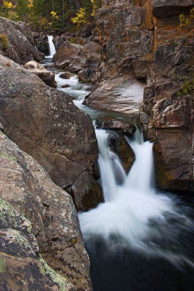 Waters Of The Poudre River Cascading Down The Poudre Falls Along