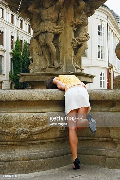 Bending Over In Skirt Photos And Premium High Res Pictures Getty Images