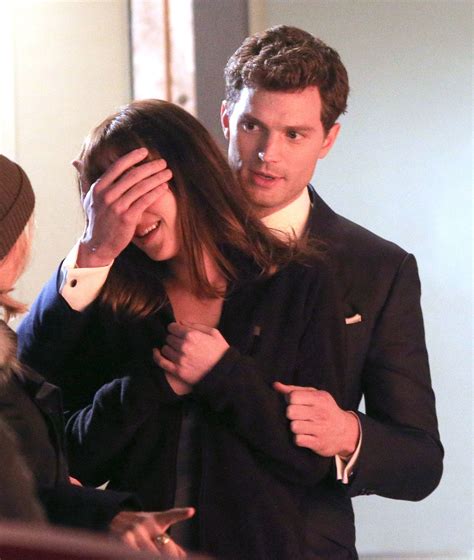 dornan covered johnson s eyes in another infamous scene as he gives the fifty shades of grey