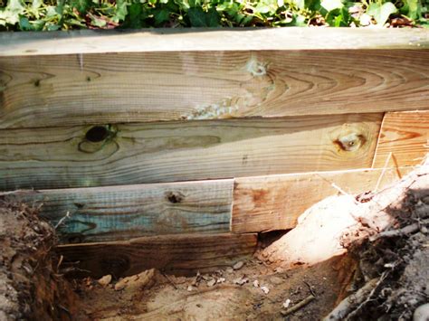 Retainer block walls are typically staggered backwards as it goes up. Building a Timber Retaining Wall | how-tos | DIY