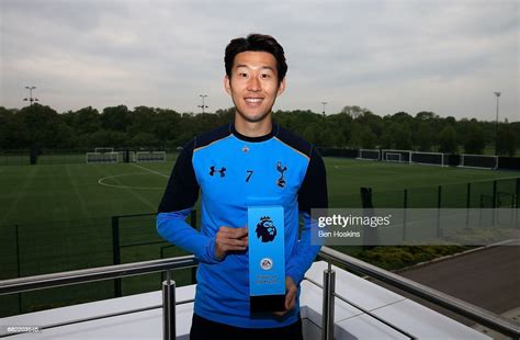 Son Heung Min Of Tottenham Hotspur Poses With His Ea Sports Player Of