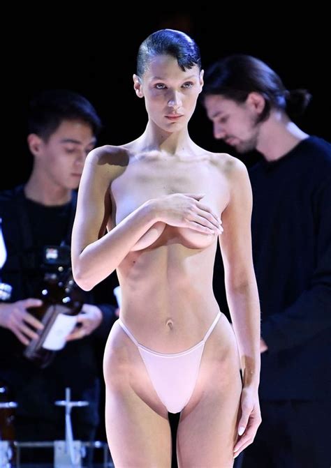 Bella Hadid Poses Topless On Catwalk Before Dress Gets Sprayed On Her