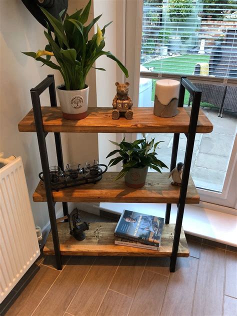 This modern shelving unit is adorned in riveted rounded elements that give it that vintage turn of the century look. Rustic industrial modern shelving unit. Sale on!!!! £80 ...