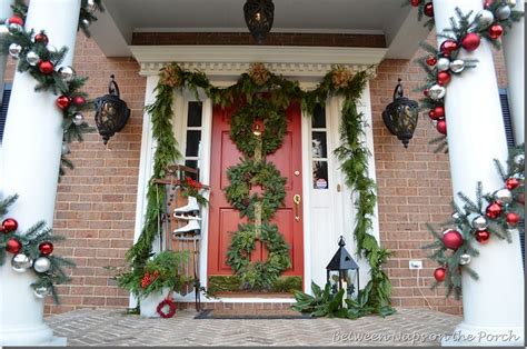 front porch decorated  christmas   wreaths  door  pottery barn knock  garland