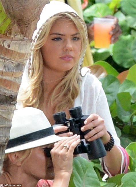 Kate Upton Risks Spilling Out Of Her Bikini As She Goes Undercover On