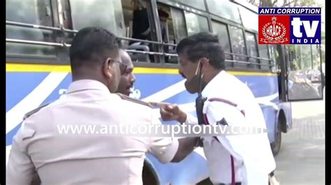 bus driver fight with traffic police belagavi karnataka anti
