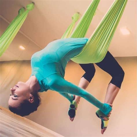 11 essential aerial yoga poses to learn today in 2020 aerial yoga poses aerial yoga aerial
