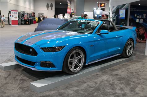 Blue Convertible Ford Mustang Dressed Up In Body Kit — Gallery