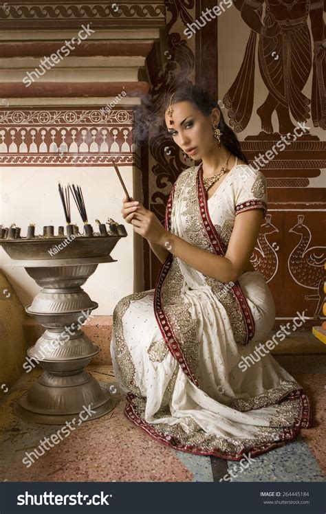 Beautiful Young Indian Woman In Traditional Clothing With Incense