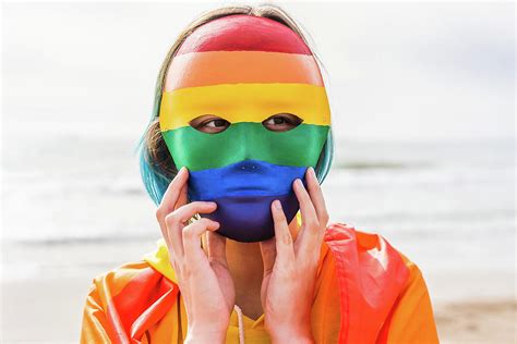Masked Person With Authentic Hand Painted Lgbt Mask On The Beach Photograph By Cavan Images