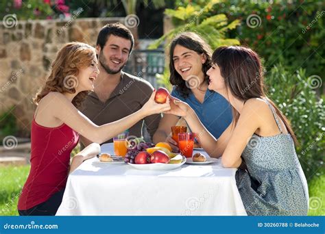 Happy Friends Enjoying A Healthy Meal Stock Photo Image Of Carefree