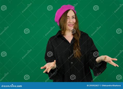 Bewilderment Woman With A Slight Smile Narrowed Eyes Fingers Spread