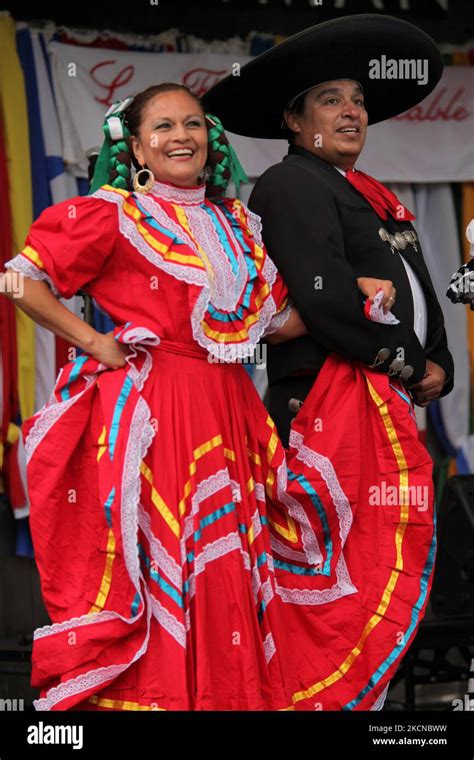 Mexican Dancers Dressed In Traditional Attire Performs A Cultural Dance