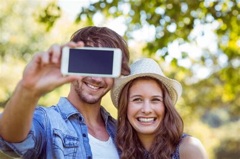 Premium Photo Hipster Couple Taking A Selfie