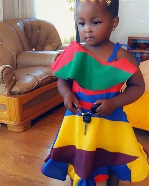 The ndebele paintings may be colourful but so is their dressing. Ndebele dress by keneilwe-khobo - Dresses and Girl Sets - Afrikrea