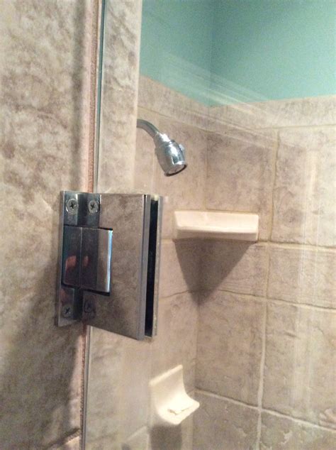 Read on for tips to keep your shower doors sparkly clean. My shower door opens out, doesn't have a catch, the hinges ...