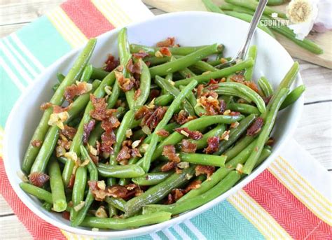 Place a small bunch of green beans (6 or 7) onto the strip of bacon and roll up into a bundle. Bacon Garlic Green Beans - The Country Cook