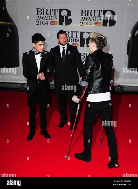 Niall Horan From One Direction Arrives On Crutches For The 2014 Brit