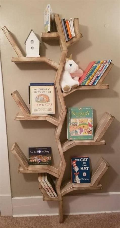 Using a jigsaw, cut out your design. DIY CRAFTS & MORE | Tree bookshelf, Rustic bookshelf ...